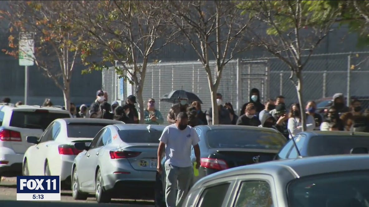 Students, parents wait in long lines to take COVID test